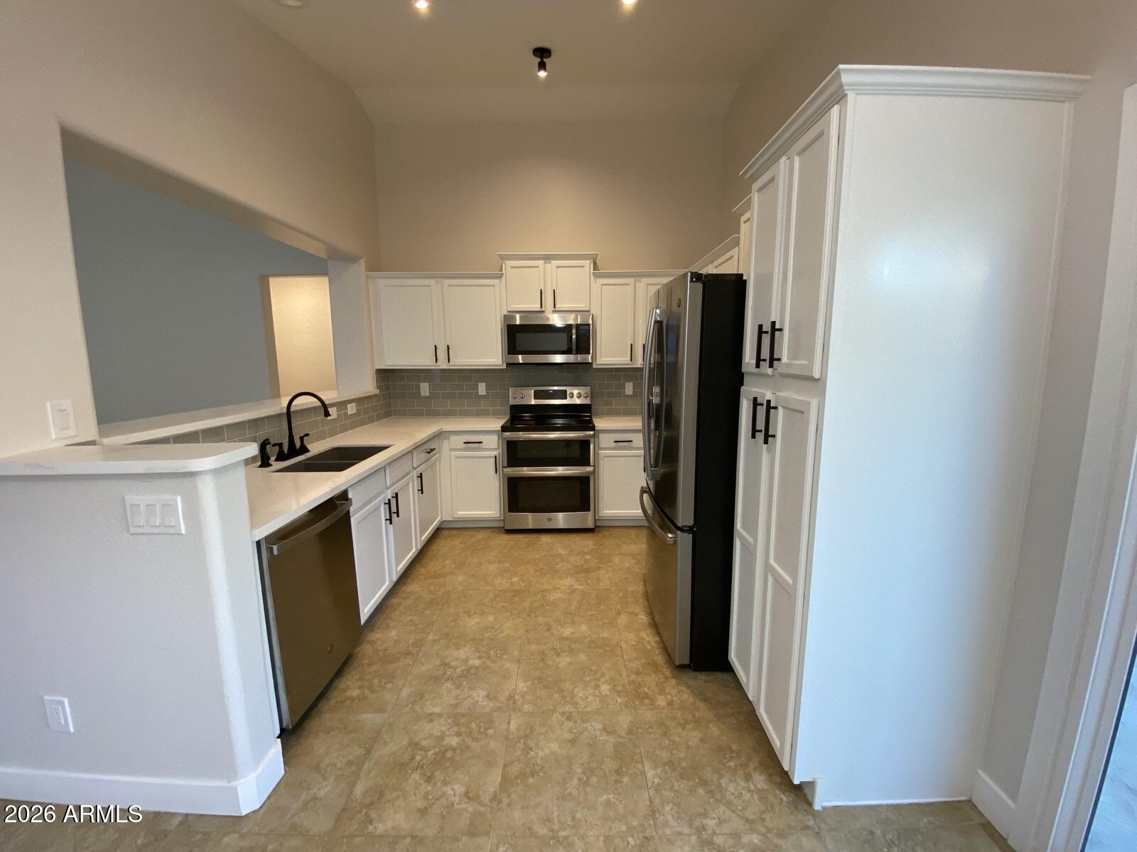 11608 W CAROL Avenue