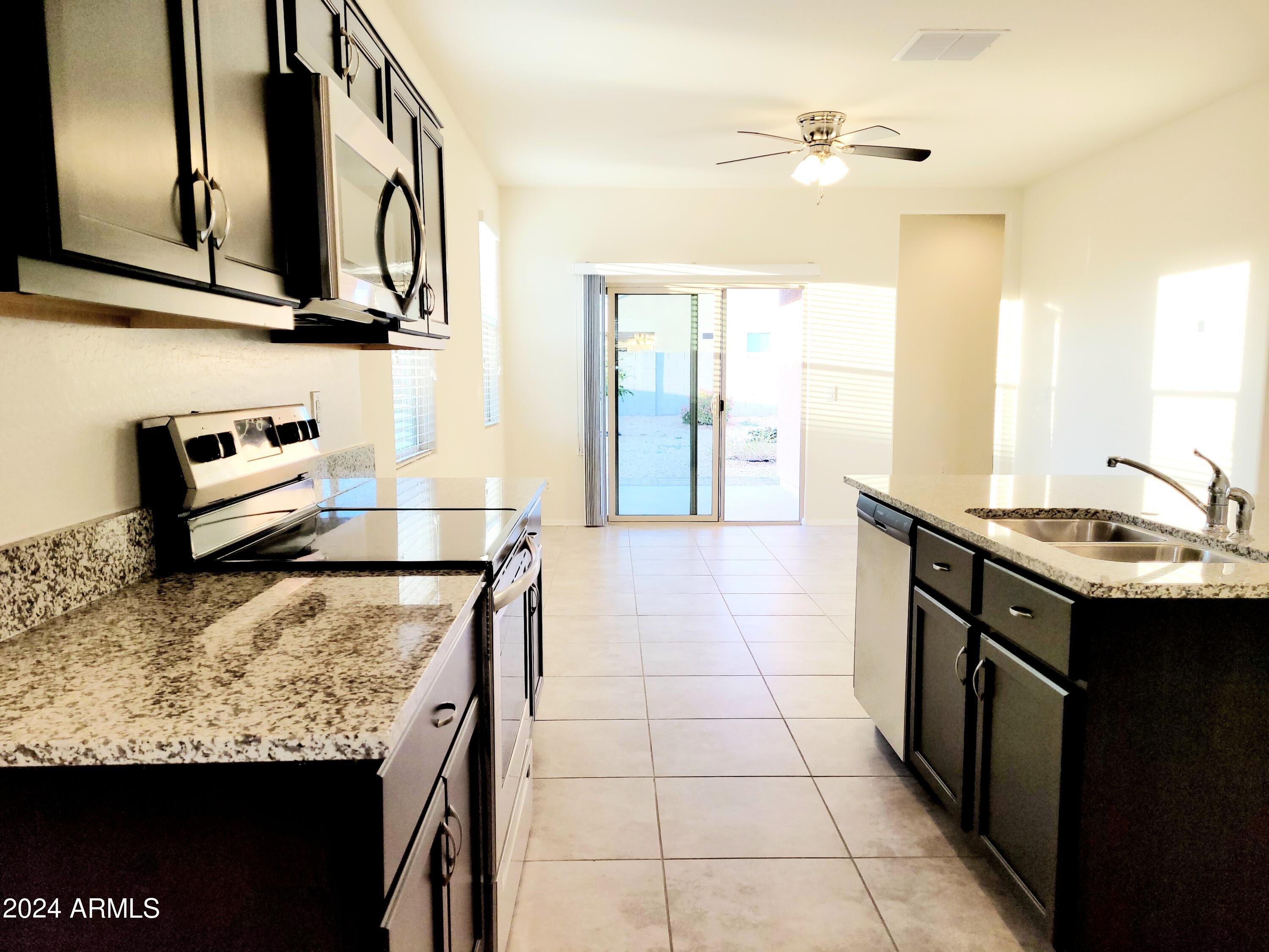 11418 E CLIFFROSE Lane