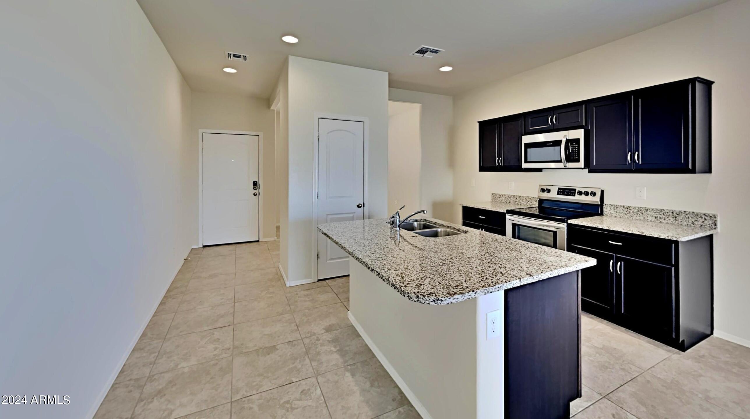 11418 E CLIFFROSE Lane