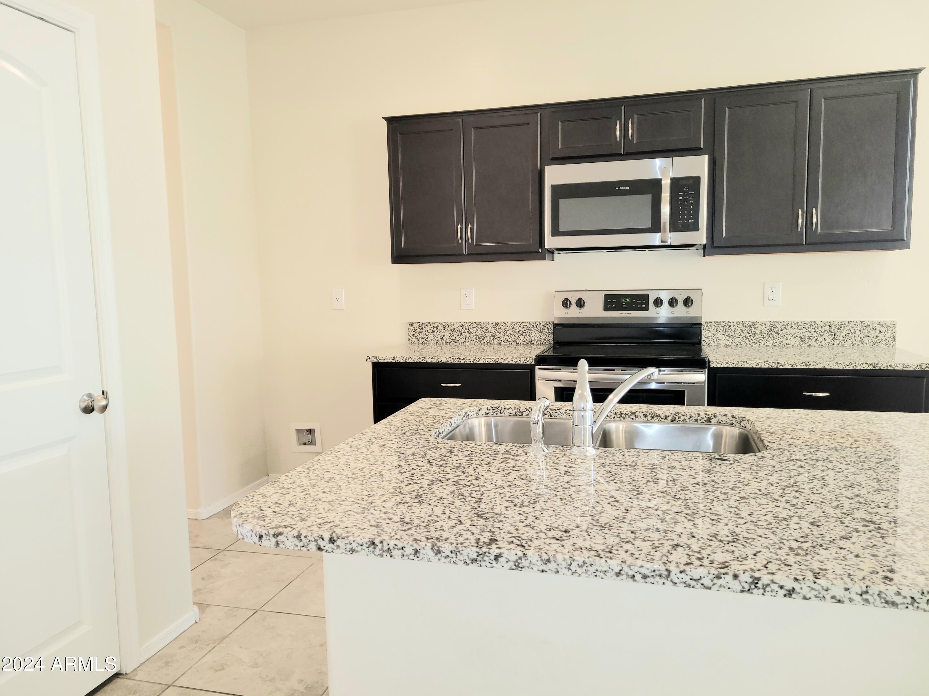 11418 E CLIFFROSE Lane