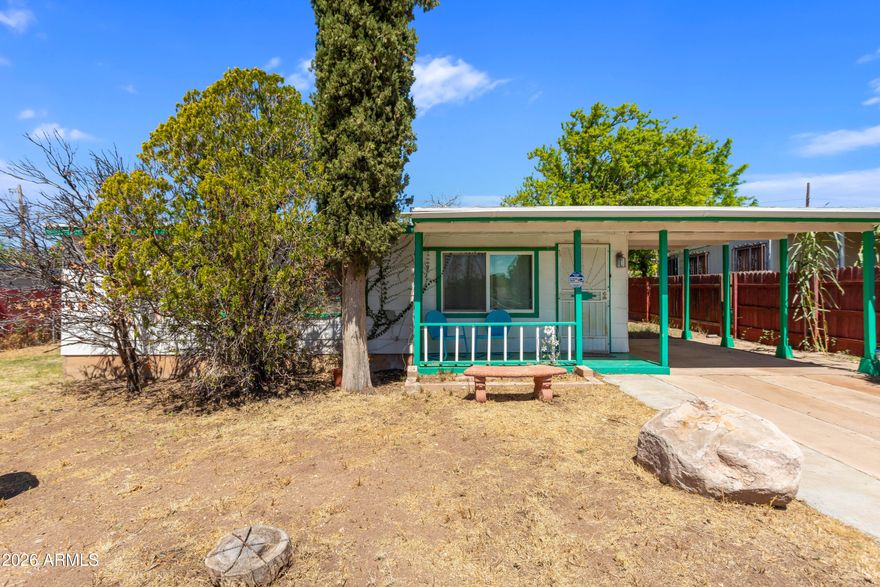 Very charming 1959 Bisbee cottage that has been nicely updated and is truly move-in ready. This inviting home offers a comfortable layout with abundant natural light, blending vintage character with thoughtful modern touches throughout. Enjoy plenty of parking and low-maintenance living, perfect for full-time residence or a weekend getaway. A wonderful opportunity to own in Bisbee and take in the gorgeous weather, scenic mountain views, and the unique charm this vibrant, historic community is known for.