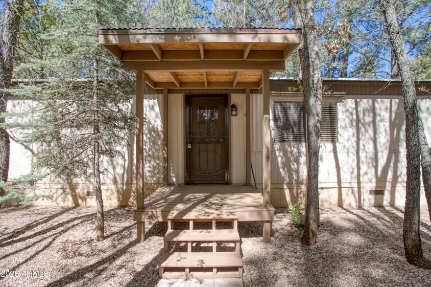 Nestled among the tall pines, this charming and affordable 2 bed, 2 bath home offers comfort, mountain serenity and peace of mind updates. Recent improvements include updated plumbing, electrical, and insulation, along with new flooring throughout, giving the home a refreshed feel while maintaining its cozy character. New covered carport for convenient parking, all set in a peaceful, tree-filled setting. Ideal as a weekend escape, rental opportunity, or full-time mountain retreat with great potential in a beautiful location.
