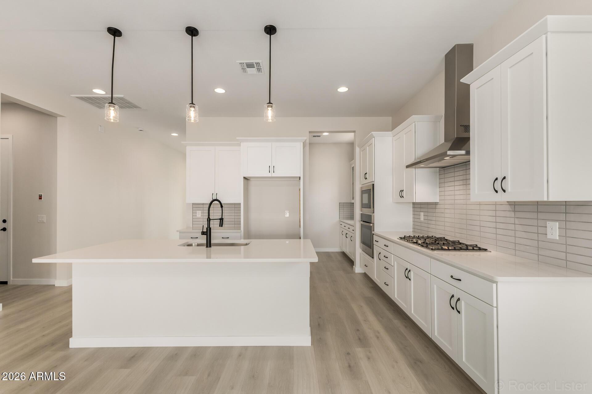 12010 W MARGUERITE Avenue