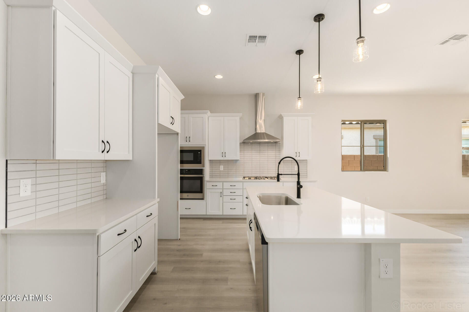 12010 W MARGUERITE Avenue