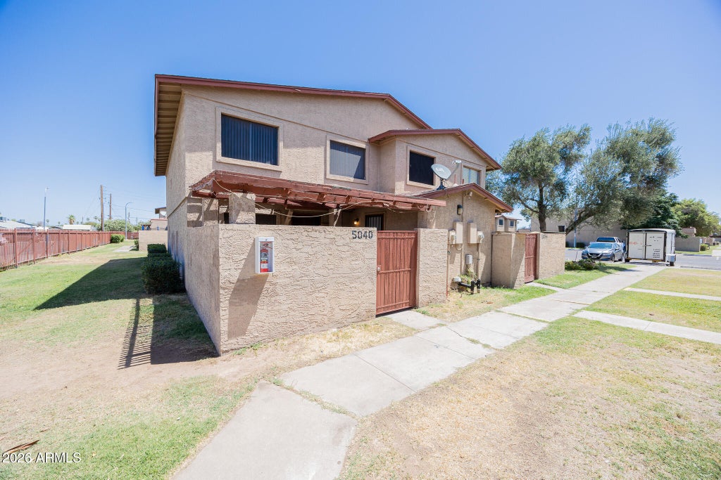 Photo of 5040 N 40th Avenue, Phoenix, AZ 85019 (MLS # 7073779)