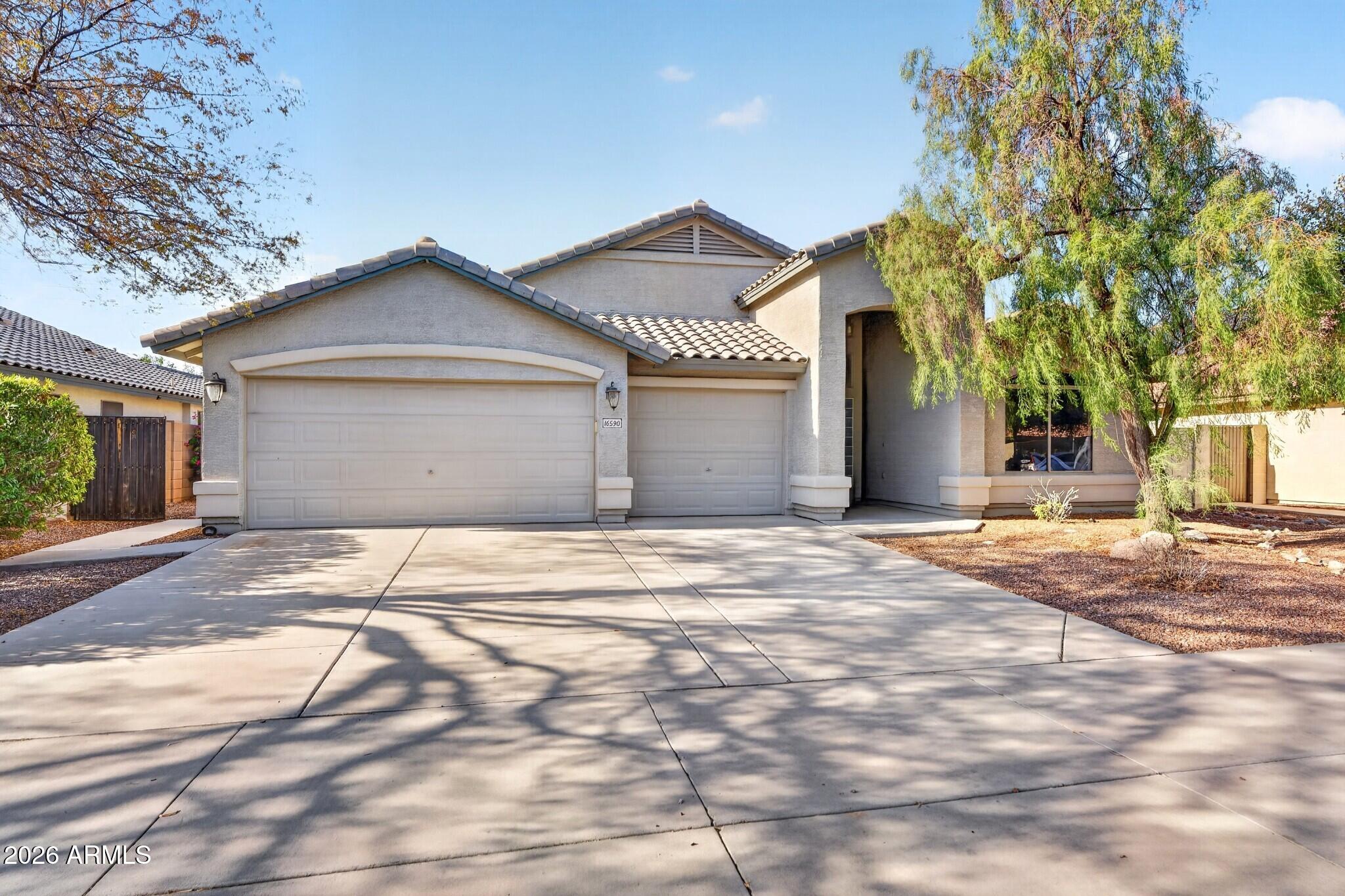 16590 W WOODLANDS Avenue