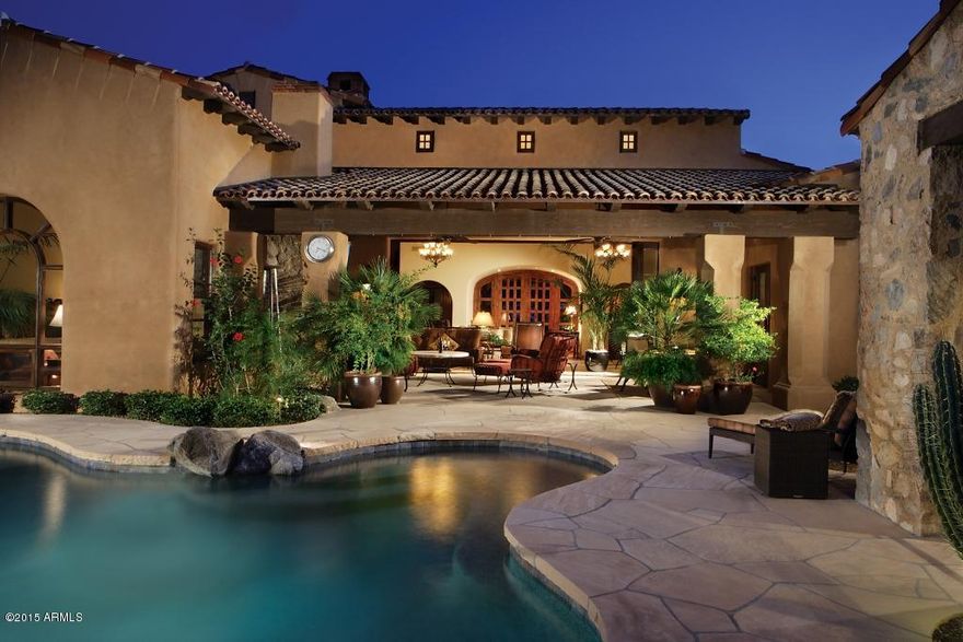 A true gem in the highly desirable Casita neighborhood in Silverleaf! Homes don't usually last long in this small enclave located adjacent to the Silverleaf Club.  A rare commbination of single level living and privacy, this 4157 sf home features 3 bedrooms, media room and detached guest house --all backing up to the mountain preserve in back & city views from the front. Features include an 800 bottle wine room, state of the art crestron A/V and lighting system, custom media room with 100'' projection screen, designer kitchen, & retractable doors in great room. True resort-style backyard living includes large covered patio with fireplace and TV, outdoor kitchen/BBQ center with bar tops and ramada, custom pool/spa, and putting green. Full sun on the pool area year round-- a perfect retreat!