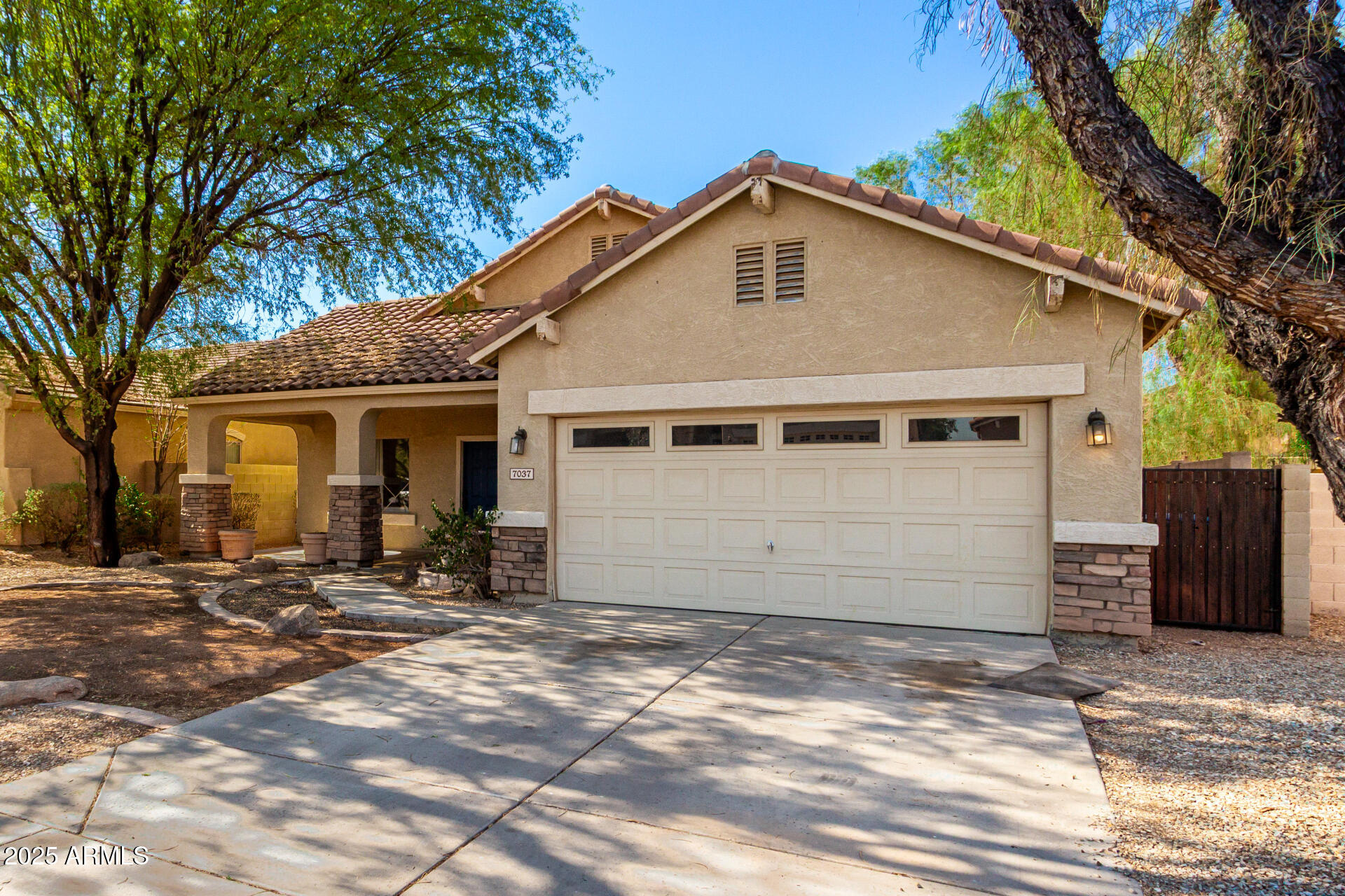 7037 W SOPHIE Lane