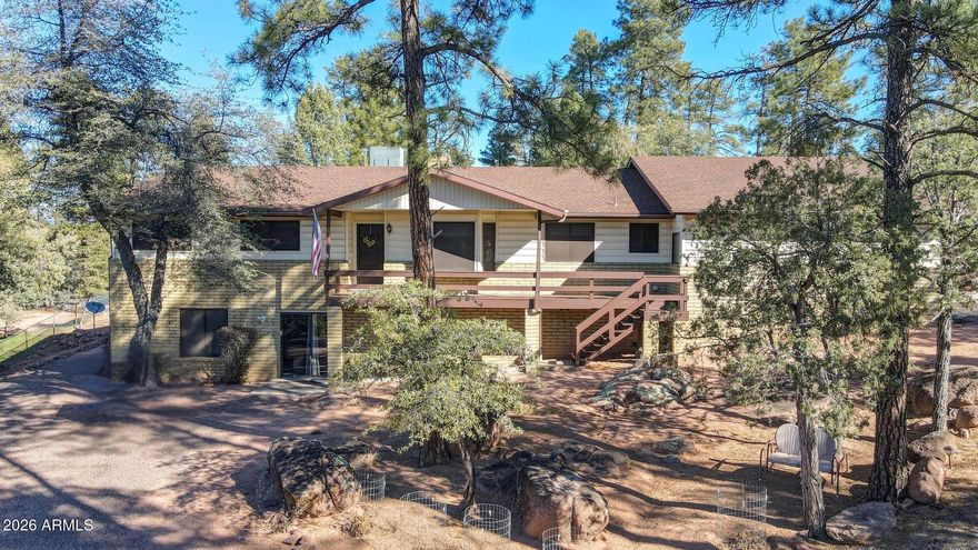 Beautifully updated, low maintenance home. Property is clean and firewised, situated on an acre lot with beautiful Ponderosa Pines and boulders. Very private in the middle of town. Easy access to parks and shopping. Main level consists of 2 bedrooms in addition to an office/bedroom. 2 baths, formal living/dining room and great room with kitchen and family room. Walk out basement with bedroom and bath, rec room. Lots of storage throughout this wonderful home. Very large backyard with areas for entertaining and gardening. Two sheds for storage and possible greenhouse. Roof and gutters replaced 2016, Generac 7039 Guardian Generator with 200A SE Transfer switch whole house backup. Property is fully fenced. Interior painting, flooring, kitchen cabinets, granite countertops, interior doors and master closet shelving all upgraded 2016. This home has been meticulously maintained and cared for.