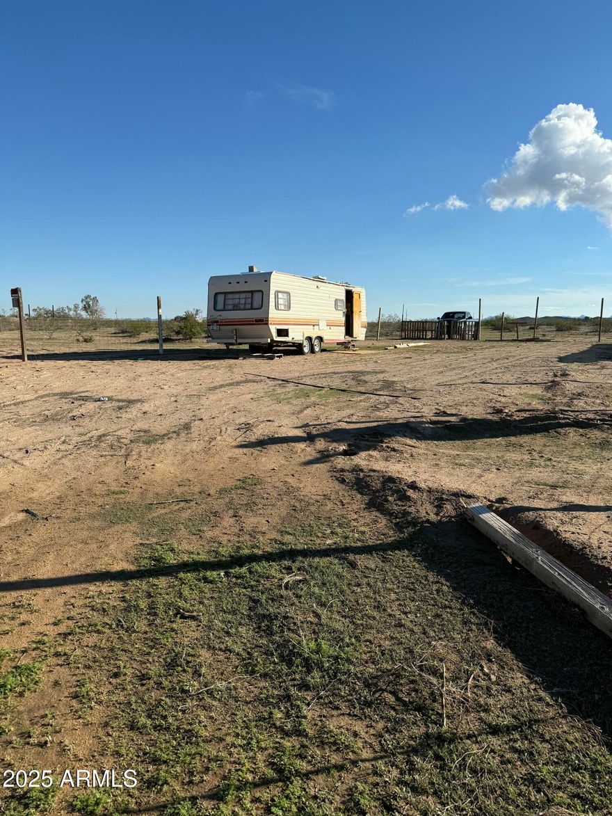Your chance to own a small piece of land in Tonopah which is rare to offer less than an acre of land.  This property is 6,330 sq ft. Land has been cleared, posting and fencing is up.  Travel trailer to convey as is.