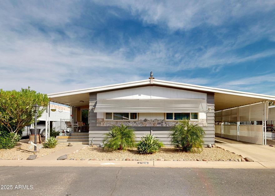 ON LEASED LAND:
Step inside this absolutely gorgeous 2 bed 2 bath home.  Updated with charm in all the right places. All new dual pane windows, roof updated, ac recently updated.  This is absolutely stunning home, it is a must see.   Most furnishings included.    Enclosed Arizona room for extra space, even a fully fenced backyard for privacy. 

Located in a gated 55 age restricted  resort style community.  Lots of activities including billiards, cards, gym, bocce ball, pitch and putt course, BBQ,  library, lounge with sports package tv.