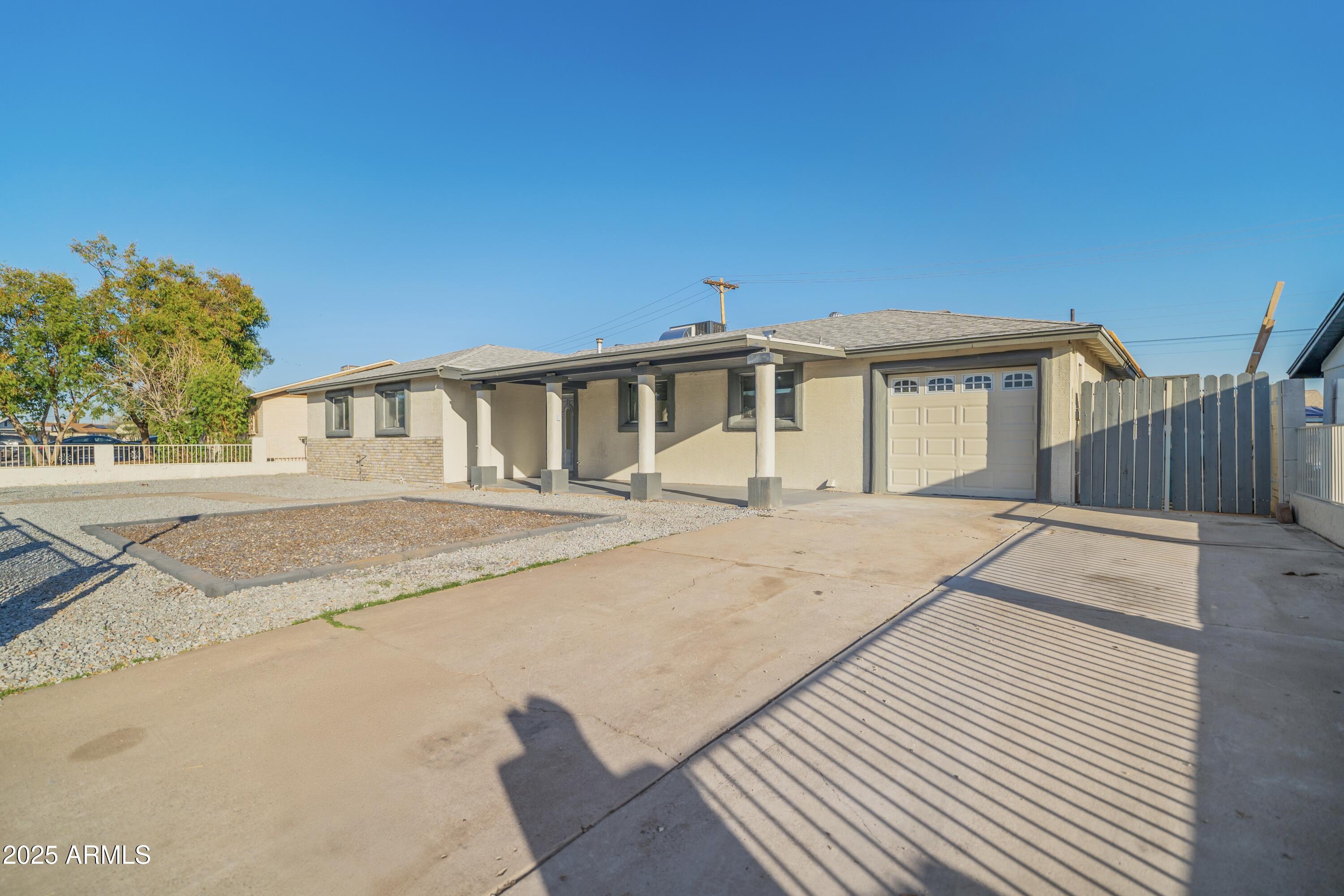 5827 W ROSEWOOD Lane