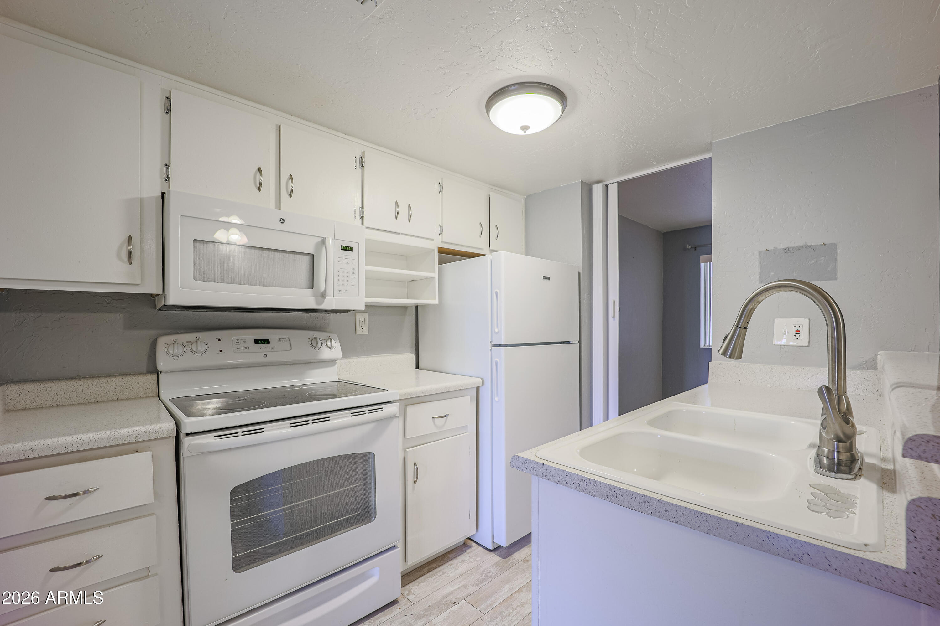 12123 W BELL Road 103
