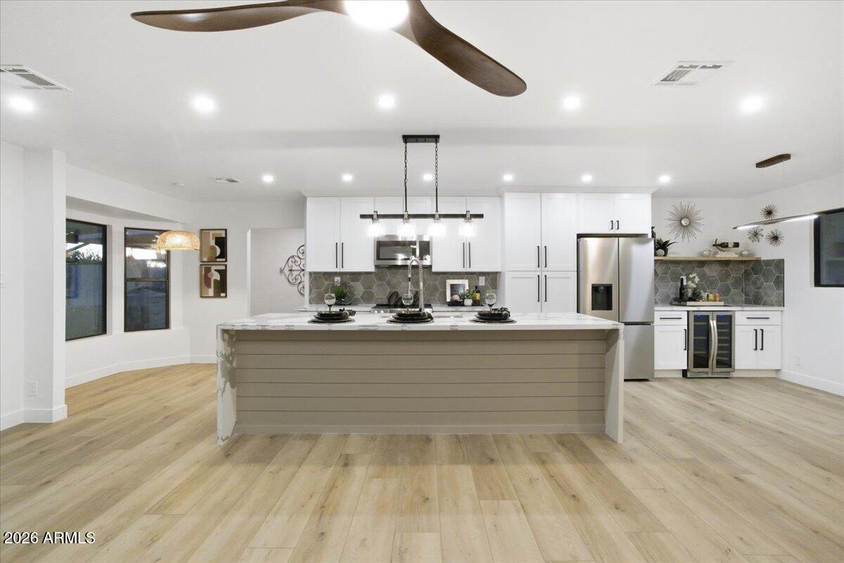 7805 E COOLIDGE Street