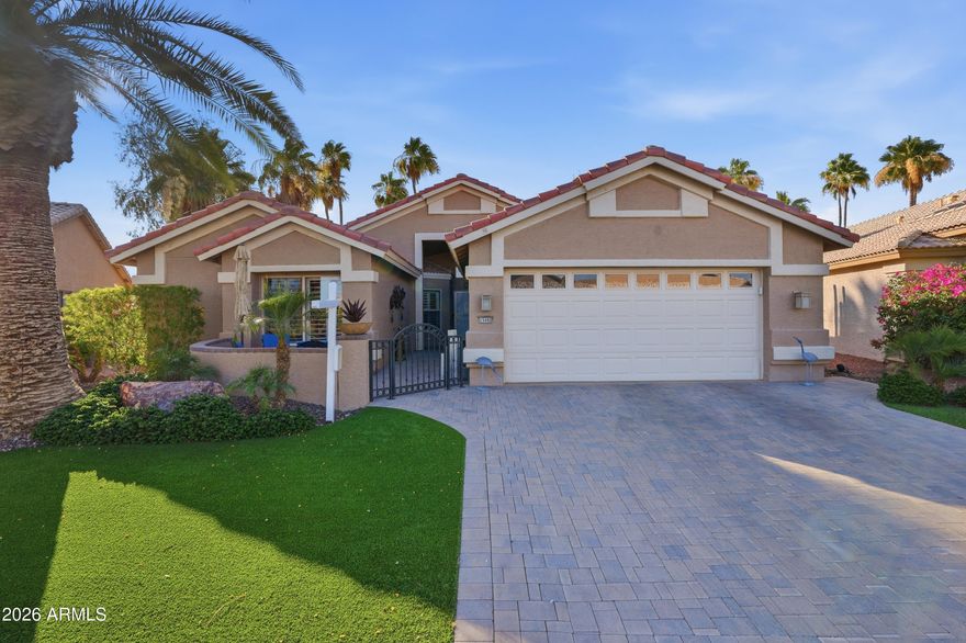 The home is on a golf course lot with a view of the Eagles Nest 7th and 8th fairways along with an amazing lake view!  This expanded Heritage open floor plan has 2 bedrooms, 2 bathrooms and a den/office.  The kitchen has granite countertops, stainless steel appliances, an abundance of cabinets and a center island with breakfast bar.  Principal bedroom is an ensuite with dual vanities and grab bars in the shower.  Home has a gated courtyard, 2-car garage with an epoxy floor with room for a golf cart, front yard is beautifully landscaped with turf, and backyard features a covered patio with misting system. Furniture and golf cart are available for sale.  Don't miss this spectacular property! PebbleCreek offers many amenities: Three 18 hole golf courses, 36 pickleball courts, tennis courts, bocce ball, two clubhouses, two fitness centers, indoor/outdoor pools, a 330-seat theater, two restaurants and over 100 clubs/organizations.