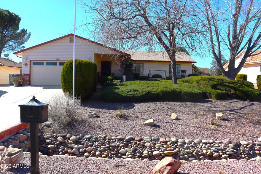 MANY FEATURES RECENTLY UPGRADED INCLUDING FLOORS, BATH; AARIZONA ROOM WITH WOOD STOVE;AND MOTORIZED WINDOW COVERINGS; COVERED PATIO, RV HOOK-UP AND PARKING.. GOLF, POOL, GYM, AND ADDITIONAL AMENITIES AVAILABLE BY SEPERATE MEMBERSHIPS