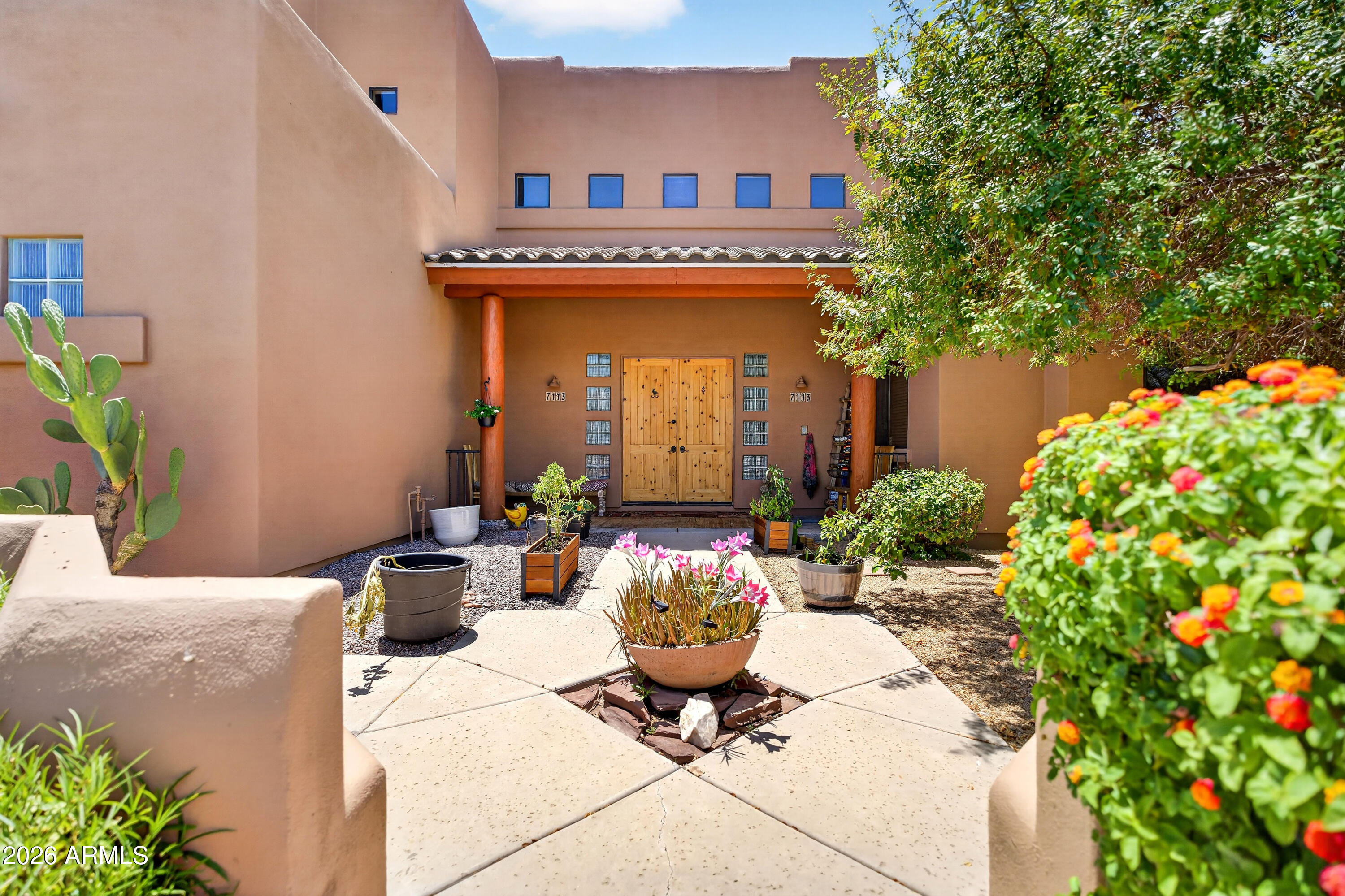 7113 E GRANADA Street