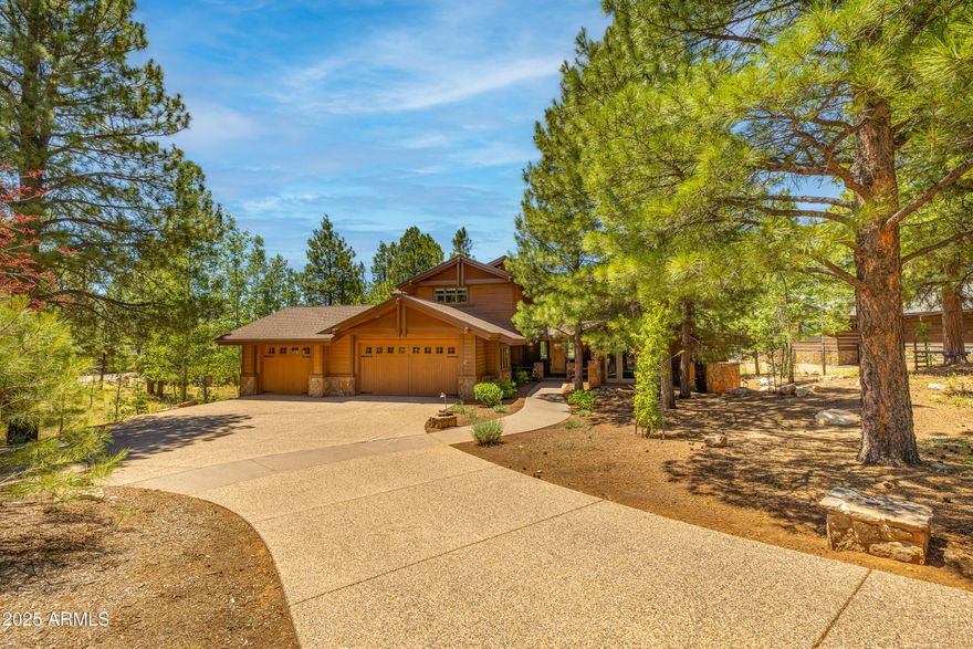 Thoughtfully designed by renowned architect William King-Colegrove, this exceptional residence showcases timeless mountain elegance with bespoke craftsmanship throughout. Richly detailed with exposed wood beams, hand-hewn hardwood floors, and a dramatic floor-to-ceiling stone fireplace, the home blends rustic charm with refined sophistication. The fully upgraded chef's kitchen is a focal point of the main level, seamlessly connected to the open-concept living and dining areasideal for effortless entertaining. Also on the main floor, the luxurious primary suite and an inviting guest room provide convenience and comfort in a beautifully curated setting.
Upstairs, a spacious loft overlooks the great room below, while a cozy family room and two well-appointed guest bedrooms offer ample space for relaxation and hospitality.
Step outside to a spectacular, partially covered deck where a second floor-to-ceiling Malapai stone fireplace anchors the outdoor living area. A built-in BBQ, custom lighting, and serene views of the 12th green complete the perfect setting for year-round enjoyment and entertaining under the pines.
This exceptional home is being offered fully furnished, allowing you to move in and immediately enjoy the elevated Pine Canyon lifestyle.