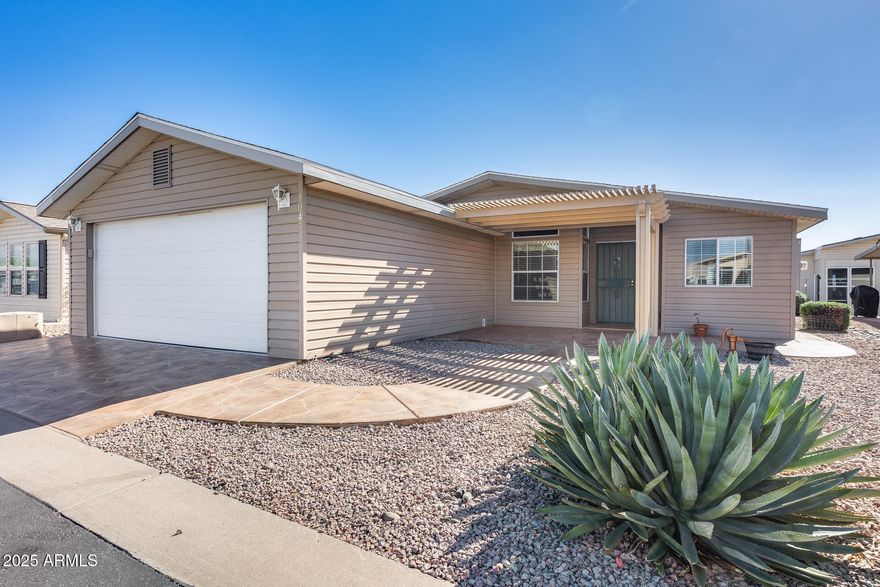 MOTIVATED SELLER•AFFORDABLE•MOVE IN READY•GREAT VALUE! Move-in ready 2 bed, 2 bath home in Dolce Vita adult community featuring a  split floor plan, private primary suite with dual sinks & walk-in closet, plus an office/den with built-in computer nook. Light-filled living with skylights, fresh neutral paint, tile in main areas, & a beautiful stained glass window adding character. Open kitchen & great room ideal for everyday living & entertaining. Enjoy the enclosed AZ room.  Exterior features: front pergola, stamped driveway/walkway, & a 2-car garage. Community amenities: heated pool/spa, clubhouse, pickleball, fitness center, & social calendar.