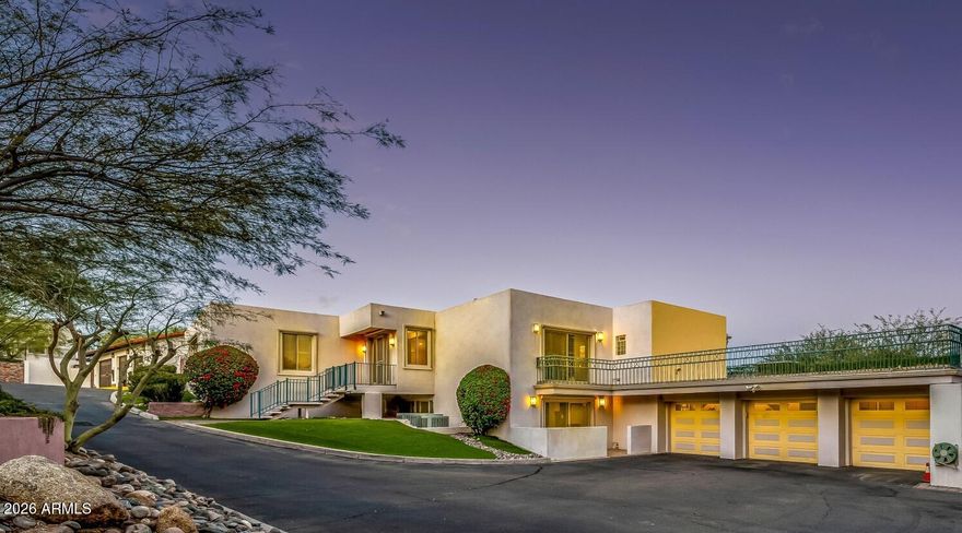 Unlock the best of the Biltmore! With a projected value of close to $7M post renovation, this 7200sqft Biltmore gem positioned at nearly the same elevation and across from the Wrigley Mansion, presents a uniquely rare opportunity. The home was thoughtfully designed and built by Bill Gosnell, who originally constructed it as his personal residence. Gosnell is widely recognized for designing and developing the Pointe Hilton Resorts in Phoenix, along with many other iconic real estate throughout the Valley. Needless to say, the structural quality and integrity of this prime location property meets the highest standards. Enjoy the home's classic beauty as it is or let us transform it with a custom remodel tailored to your vision. NO HOA! Split floor plan featuring a carpeted living room, plantation shutters in select windows, two convenient powder rooms for guests, & custom paint finishes. The kitchen has white cabinetry, dark counters, built-in appliances, a large breakfast bar island, & a pass-through window. Adjacent, the inviting family room showcases a gas fireplace, a stylish dry bar, & multi-slider doors to the backyard. The primary suite offers direct outdoor access, two walk-in closets, a private bathroom, & direct access to a spacious office. The office includes its own exterior access! Additionally, generously sized bedrooms each include walk-in close. Downstairs, the walk-out basement expands the living space with a two-way fireplace, an oversized bonus room with mirrored-door closets & a large utility room, & extra bedrooms. A laundry room with a sink & cabinetry adds everyday convenience! The property also provides a 3-car garage with built-in cabinetry + gated extra-long driveway. Outdoors, enjoy artificial turf, multiple covered patios, a large balcony, a sparkling blue pool, & breathtaking mountain views. See it, love it, live it!