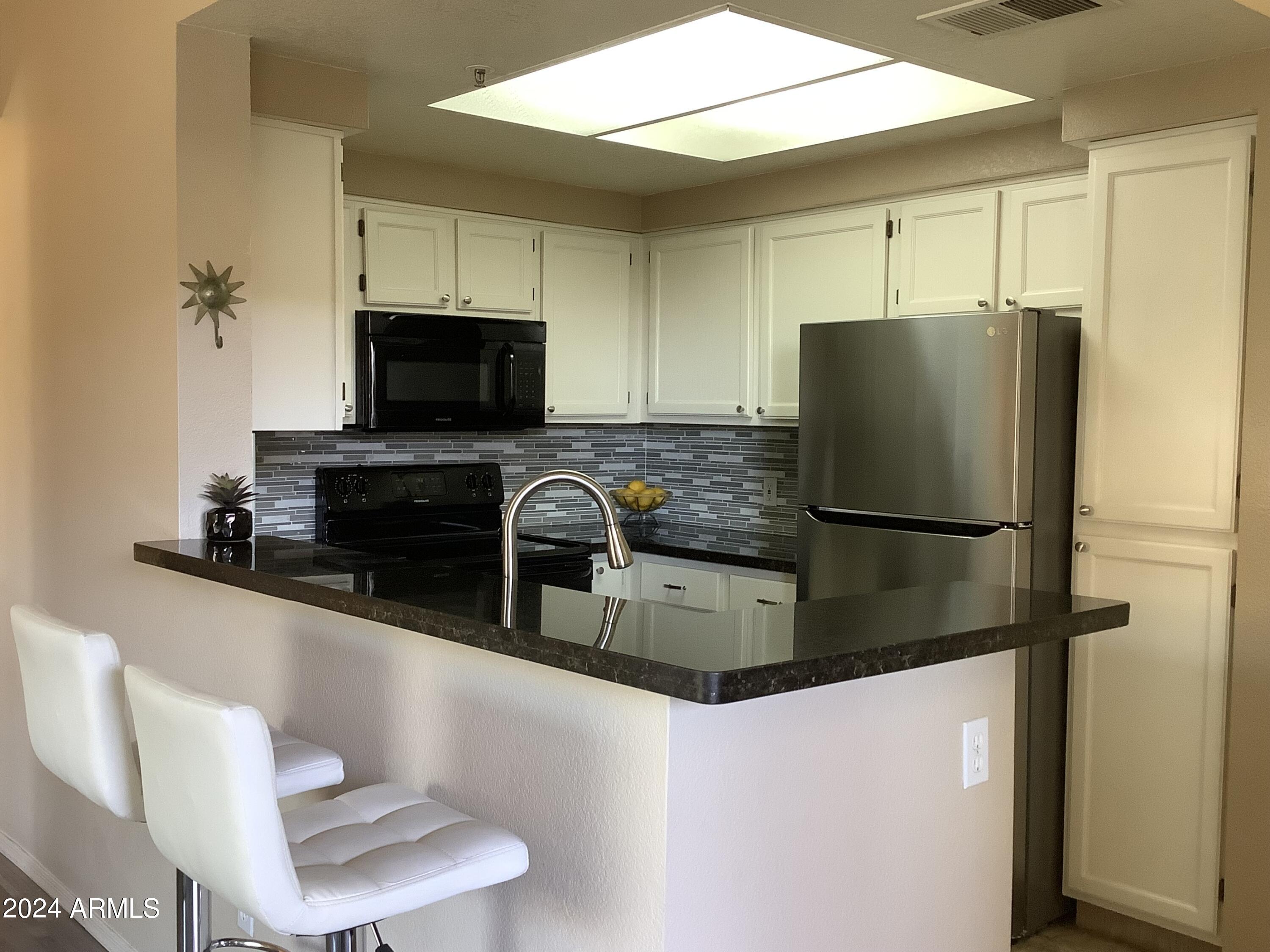 9450 E Becker Lane 2013