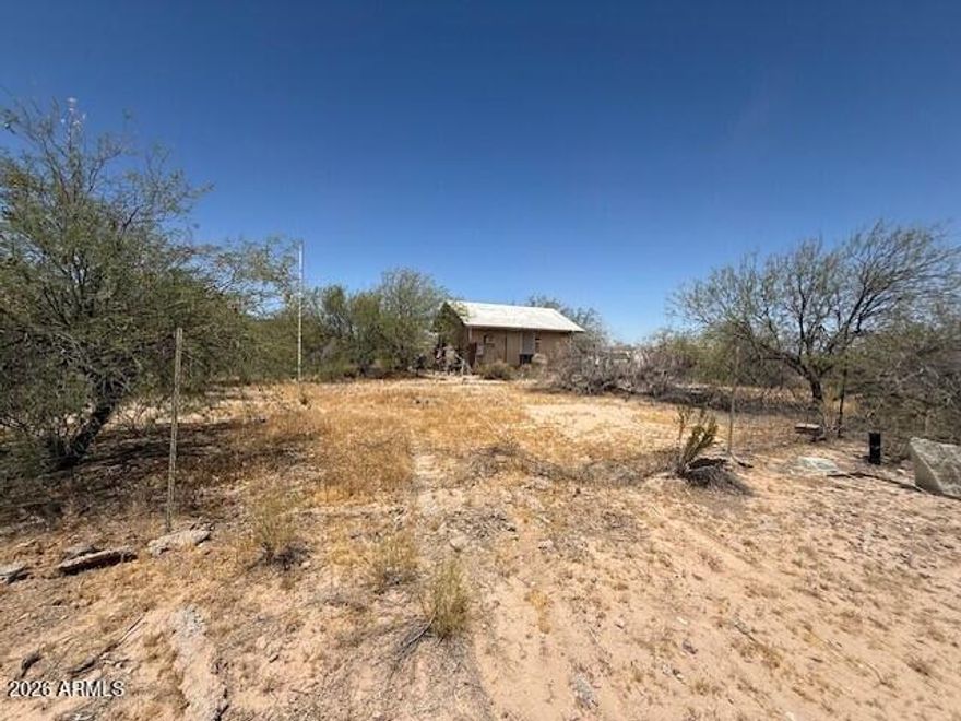Enjoy peaceful country living with incredible mountain views! This 1-acre residential lot offers the perfect escape from the city with water and electricity already on the property. The flat, usable land provides an excellent opportunity to build your dream home or hold as an investment. Easy access via a level dirt road makes getting to the property easy. An original structure remains on the property but is uninhabitable and conveys as-is. Surrounded by beautiful scenery and wide-open spaces, this is a great opportunity to enjoy the quiet lifestyle you've been looking for.