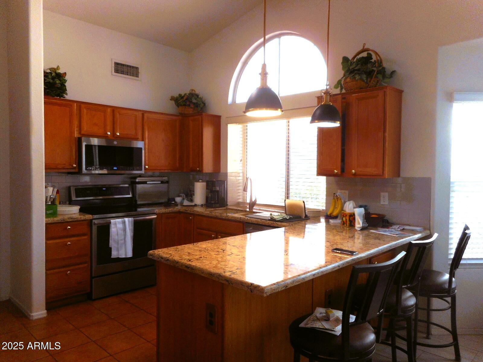 8701 W BEHREND Drive