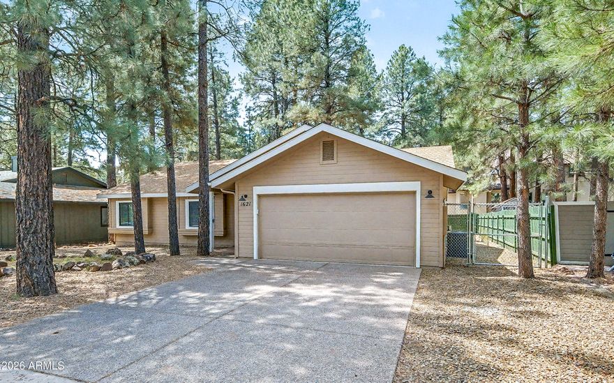 Back on the market! This beautifully remodeled, darling, single-level home in the highly sought-after University Heights neighborhood is a rare find! Just minutes from downtown Flagstaff, this charming, fully upgraded mountain retreat offers the perfect blend of modern luxury and serene nature. Completely reimagined with extensive updates completed in 2024. Set within an established, walkable neighborhood of mature trees, minutes from downtown Flagstaff and adjacent to Northern Arizona University, the home offers the perfect blend of comfort, style, and location--along with a peaceful, private setting. The home features all-new, whole house
flooring, cabinetry, countertops, tile showers, designer lights and fans, new appliances, fresh paint, and complemented by modern, wood-trim accent walls with
soaring vaulted ceilings; giving the home a bright, fresh and airy feel.

Inside, enjoy a sleek, Gourmet Kitchen, complete with Quartz counters, Apron sink, pull down spring Spray-Wand Kitchen faucet, white brick backsplash, stainless appliances, extensive custom cabinets & Kitchen Island. Outside, the backyard boasts an expansive elevated deck, a fire pit, and a fully fenced yard creating an ideal
setting for expanded living--perfect for relaxing or entertaining while taking in breathtaking
panoramic forest views.
With no HOA and easy access to the Flagstaff Urban Trails System, nearby parks,
shopping, and dining, this is a unique opportunity to own in one of Flagstaff's most
beloved neighborhoods at a compelling price point. Whether as a full-time home,
weekend escape, or income-producing retreat, opportunities like this in University
Heights don't come along often--don't miss it.