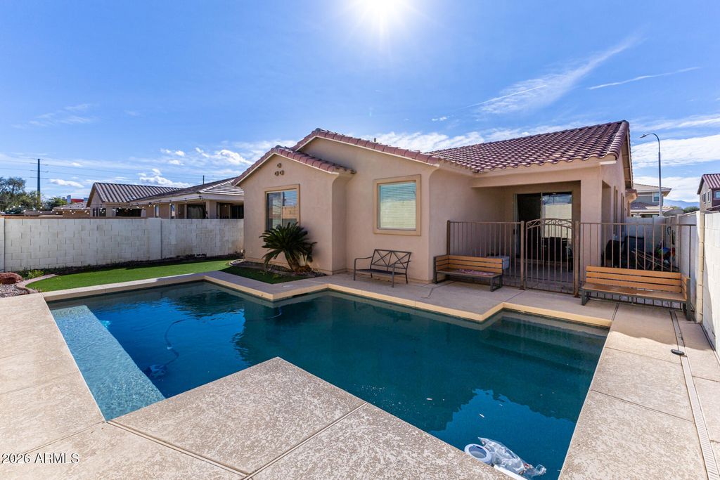 Photo of 10768 W Woodland Avenue, Avondale, AZ 85323 (MLS # 6986746)