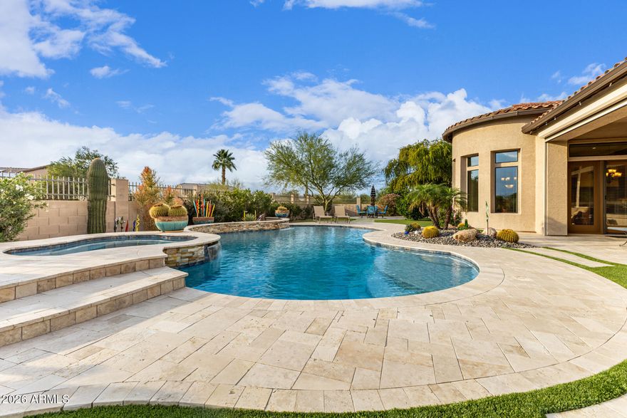 Extraordinary desert estate offers the perfect blend of refined luxury and resort-style living. Set on an expansive .80-acre lot, this impressive 5,388-square-foot single-level residence showcases elegant design, spacious living areas, and exceptional indoor-outdoor entertaining. -From the moment you enter through the private courtyard, the home welcomes you with sophisticated architecture, soaring ceilings, and warm custom finishes. The thoughtfully designed floor plan features five generously sized bedrooms and multiple private suite spaces, ideal for guests, multigenerational living, or executive home offices.
-At the heart of the home, the gourmet chef's kitchen impresses with an oversized center island, granite countertops, premium stainless appliances, a wine chiller and a butler's pantry--seamlessly opening to the great room where exposed beams and expansive gathering spaces create an inviting atmosphere for entertaining. 
-The luxurious primary retreat offers a private sanctuary with spa-inspired amenities including dual vanities, a soaking tub, walk-in shower, and expansive closet space.
-Step outside to your newly enhanced backyard oasis, where a resort-style pool and spa transform the space into a private retreat. Surrounded by the beauty of the Sonoran Desert and breathtaking mountain views, the outdoor living areas are designed for year-round Arizona living--perfect for relaxing, entertaining, and enjoying spectacular sunsets.
-Additional highlights include:
Four-car garage with epoxy flooring
Expansive .80-acre lot offering privacy and space rarely found in this premier community.
RV gate and extended parking
Energy-efficient construction 
-Estrella Vista is part of the Mountain Bridge community, hosting incredible amenities, activities, clubhouse, and grounds. Included with such is an impressive Pickleball community with daily drop-in play, ladies ladder play, live ball, tournaments, and reservable courts for private play. 
-The clubhouse also includes fitness center with classes, heated pool for lap swimming, water aerobics, and family play. Two spas, tennis, basketball, putting and chipping, greens, playgrounds, and miles of walking paths. The community hosts, food trucks, live music, and weekly activities. 
There's much to see and experience in this northeast Mesa location with easy access to the 202 as well as hiking, fishing, mountain biking, golf courses, Gene Autry tennis and pickleball center, and more!