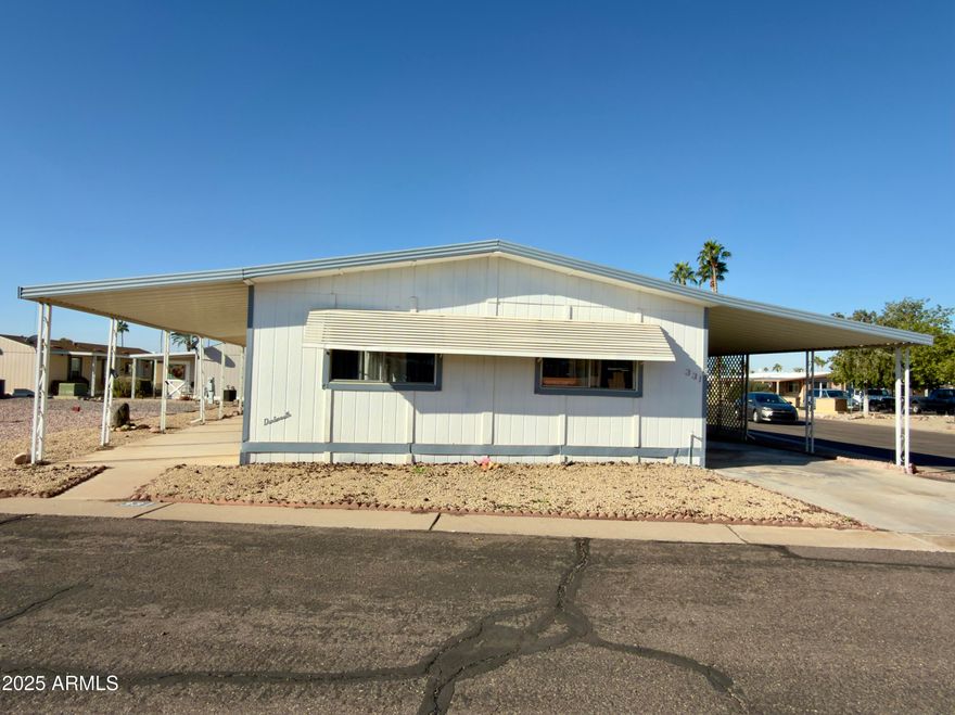 Updated manufactured home in desirable Sierra Del Saguaro, a quiet 55 plus pet free community in Apache Junction. This charming 2 bed 2 bath residence features tasteful remodeling completed in 2024, offering comfort and convenience. Located close to the community clubhouse and just minutes from freeway access, it provides easy connectivity while maintaining peaceful living. Inside, enjoy upgraded finishes, functional layout, and natural light throughout. Perfect for those seeking a low maintenance lifestyle in a well maintained neighborhood. Priced to sell, do not miss this opportunity to enjoy Arizona living with nearby amenities and gorgeous mountain views.