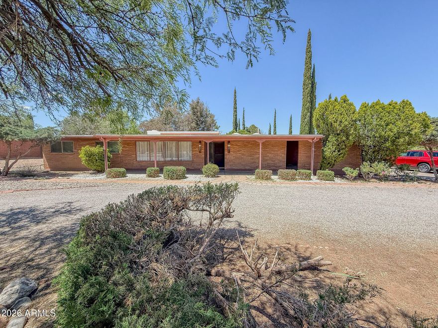 Welcome home to this spacious 4-bedroom, 2-bath property offering approximately 2,300 sq ft of comfortable living space on a generous half-acre lot in Sierra Vista. With room to spread out both inside and out, this home offers the perfect blend of space, functionality, and convenience. The thoughtfully designed floor plan features multiple living areas, sizable bedrooms, and ample natural light throughout. Outside, the oversized lot offers endless possibilities for entertaining, gardening, pets, or simply enjoying Arizona's beautiful sunsets and open skies. Conveniently located near shopping, dining, schools, and Ft. Huachuca, this property combines peaceful living with easy access to everyday amenities.