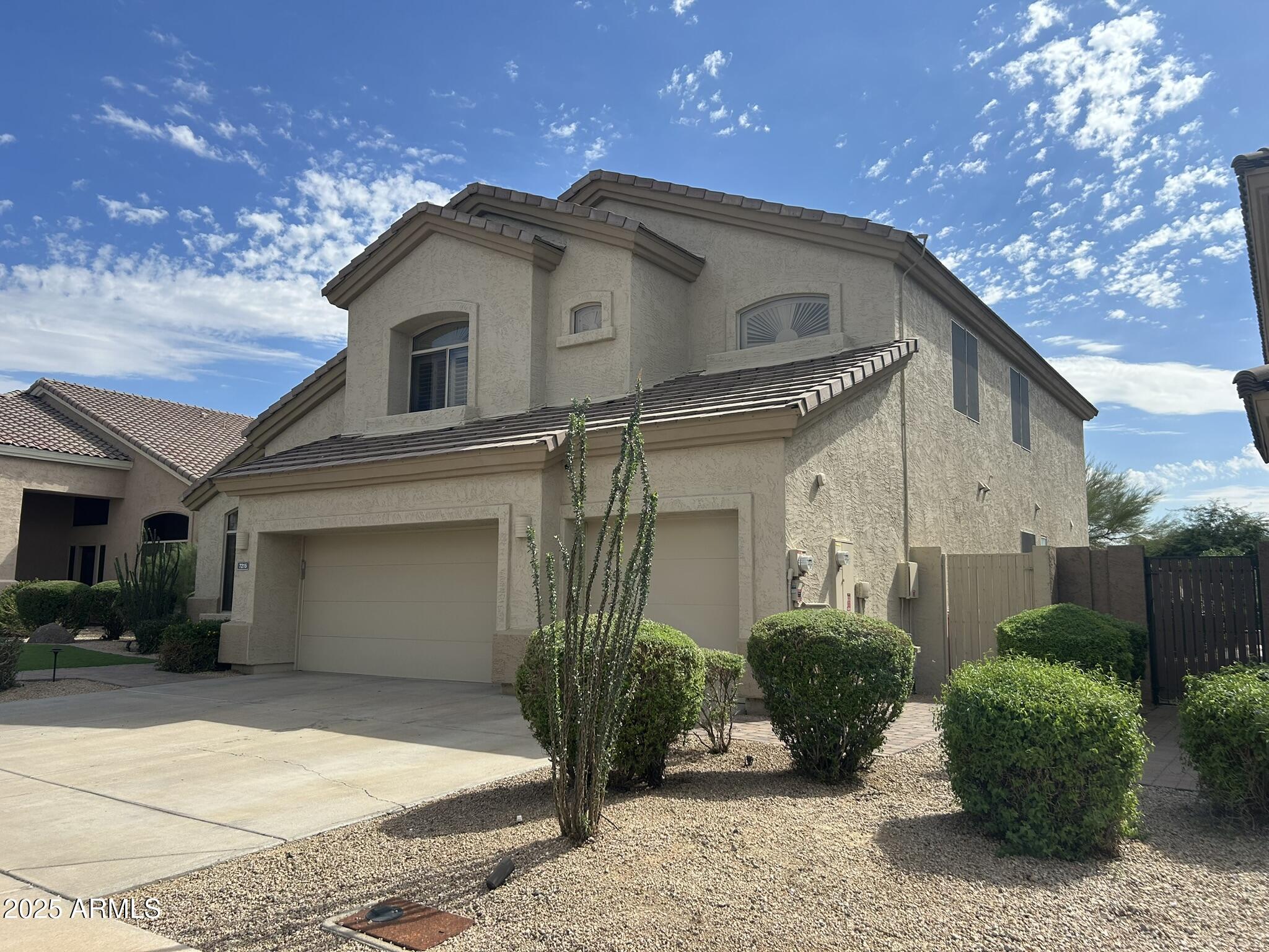 7215 E WHISTLING WIND Way