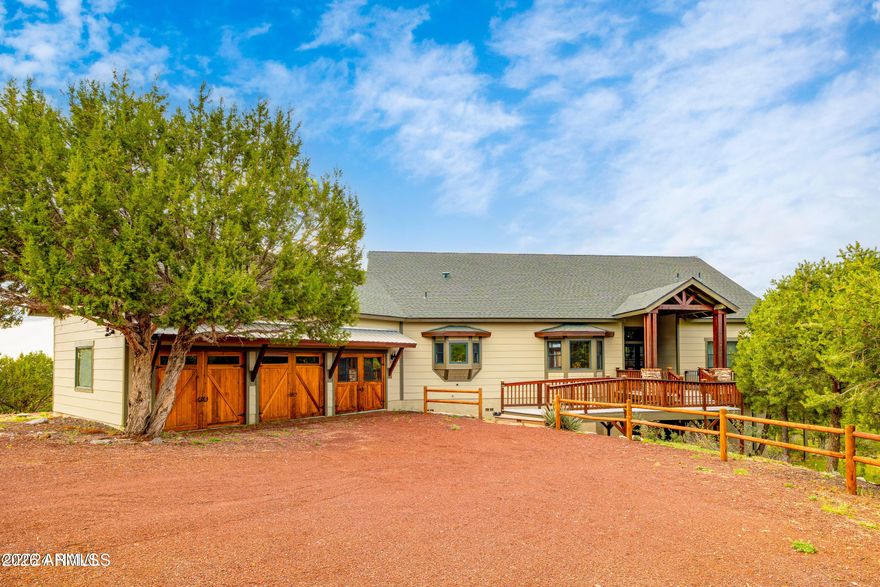 Welcome to 2667 E Overlook Dr in Williams, Arizona--your gateway to luxury and adventure. This stunning property, located in the exclusive gated community of Cedar Mountain Heights, offers over 2,600 square feet of luxury country living on 6 acres of high desert chaparral. It's the perfect retreat for families looking for a vacation home or for an investor seeking a lucrative VRBO opportunity after waiting period is satisfied. Situated just 50 miles south of the Grand Canyon, 15 miles from Route 66 and Bearizona, 42 miles to Flagstaff, and 70 miles to Sedona, this property serves as an ideal base for exploring Northern Arizona's most iconic destinations. The area is famous for its exceptional stargazing--imagine the entire Milky Way visible during new moons