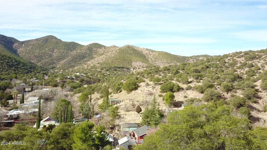 $70,000 for one buildable parcel (5,120 sq ft/ 80ftx64ft) at the end of Locklin Avenue with gorgeous views to the West and South in Old Bisbee. Right up the canyon from all of the Bisbee attractions, these parcels are in a prime location to enjoy the culture that Bisbee has to offer while experiencing the quiet of a canyon at the end of a cul-de-sac. Each plot is buildable. This North East lot is already cleared and leveled to begin building your dream home. There are two other buildable lots (prices below). Utilities accessible. Investors, great opportunity to build a trio of STVRs. Add'l Prcls- 103-56-004H0: 80x70, 0.128 Ac, 5,598 sqft. 103-56-004K4: 70x64, 0.102 ac, 4,480 sqft.