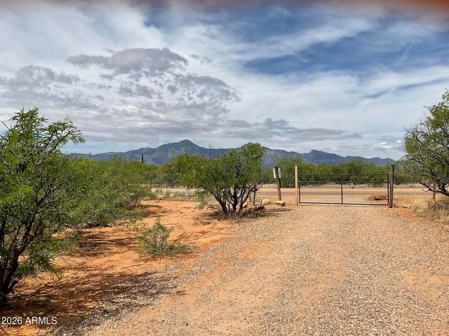 Home is located on the center of 4-acres. The home is well hidden by indigenous plant live and has 360 view of the surrounding mountain ranges (Huachuca's, Dragoon, Mule Mountains) and view of the San Pedro River valley. The lots has plenty of available land to create a small ranch or fields of gardens. The entire property is fenced-in.