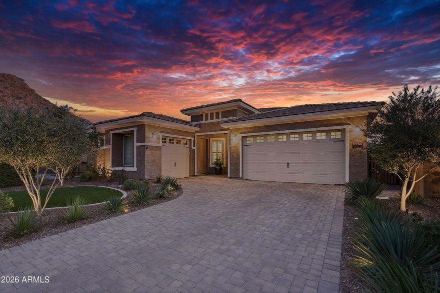 Welcome to Northlands, one of North Peoria's most remarkable communities. Here, in the heart of the Sonoran Desert, you'll experience the vivid oranges, purples and pinks that grace the skies as the sun sets beyond the mountains, and smell the earthy sweetness of the creosote in the air just before a summer rain. 
Shown like a model home, this highly upgraded Adelaide plan from Taylor Morrison has 2483 sq.ft of interior living space with 4 bedrooms and a den, plus 3 full baths and a 3 CAR Garage. Great curb appeal with wrought iron entry doors, matching glass & iron square pendants in the front entrance and foyer. Open concept main living area with a light crisp color palette, warm natural pine LVP flooring throughout the house, new 5 in baseboards, LED can lighting, with classic wood shutters added to all windows. Curated lighting with updated ceiling fans throughout the home, creating beautiful light and reflection throughout the dining and living areas. Open concept dining area with a bold navy accent wall paired with a glass globe round chandelier. Kitchen features quartz countertops and island, white cabinets, white marble elongated hexagon tile backsplash, large glass globe pendant lighting, stainless steel appliances with double ovens and hood, a new dishwasher and microwave, a walk-in pantry for all your storage needs plus a cozy breakfast nook with updated chandelier and classic wood shutters.
Step into your master suite, light and bright with a patio door, giving you access to your outdoor space. Master bath features double sinks with two round mirrors, globe sconce lighting, white cabinetry, a large walk-in shower shower w/seating and a hexagon tile backsplash, a separate toilet room, and a spacious walk-in closet. 3 additional bedrooms w/ updated ceiling fans and wood shutters, 2 full bathrooms, plus a spacious den currently set up as an office space, giving you plenty of flexibility or privacy. Main garage features built-in cabinets and a workbench with epoxy flooring in both main and secondary garages. 
Outside, you'll enjoy every moment with a sparkling pool and hot tub, a covered patio with mechanical sun shade, a 12 x 12 pergola with a seating area, and the Calderwood Butte glowing in the background. Front and back yard landscaping has been updated with new turf, plants, trees, irrigation, and landscape lighting.
There truly is nothing to do except move in and live your absolute best life. Enjoy the outdoors with several neighborhood bike paths, green spaces, walking, and hiking trails. 10 minutes to the 85-acre Paloma Park with lighted ball fields, pickleball, dog park, fish lake & deck, playground and picnic ramadas and serene Lake Pleasant within 20 min. providing you with a unique experience, countless water and outdoor recreations, including boating, fishing, kayaking, swimming, relaxed paddle-boarding and much more. Close proximity to 303 freeway access, 17 minutes to TSMC, shopping, dining, entertainment, and health care. A list of features, updates, floor-plan is available in the documents tab.