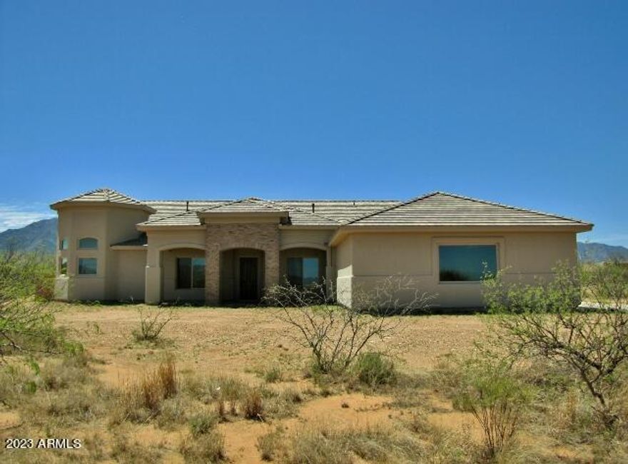 This spacious, 4BR+den/3BA/3CG, 3394 sq.ft. rental on 4 acres in Hereford, AZ is minutes from Sierra Vista and Fort Huachuca, shopping, schools and Canyon Vista Medical Center. The open, split floor plan includes a large living area with a built-in entertainment center and wood pellet stove, a beautifully updated kitchen, large master suite with sitting room/den and a huge 3-car garage. The back yard is fenced with views of the Huachuca Mountains. Call today.