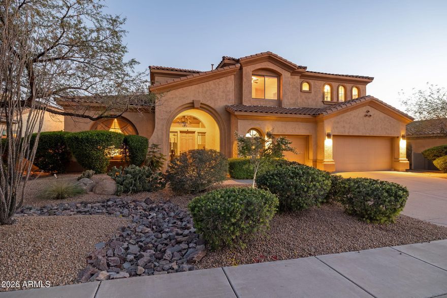 Gorgeous Toll Brothers Home offers a combination of Privacy, Elegance, &  Breathtaking desert Beauty. Backing to a Pristine Natural Preserve & showcasing front Views of the Superstition Mountains, the home delivers an exceptional Arizona Living Experience. Inside, refined craftsmanship & thoughtful design create a warm yet sophisticated atmosphere. The gourmet kitchen is a chef's dream, appointed w/ designer slab granite countertops, double ovens, stainless steel appliances, & a large center island w/ generous seating. Upgraded cabinetry & a large pantry provide both beauty & functionality--perfect for entertaining or everyday luxury. The open-concept family room features vaulted ceilings & a cozy gas fireplace that creates an  inviting focal point for gathering. Rich Brazilian Hardwood Flooring enhances the living room, dining room, primary bedroom, & den, while upgraded Tile flows throughout the great room, adding both elegance and durability.

The dramatic two-story foyer showcases an impressive staircase, creating a striking architectural statement upon entry. The formal living & dining areas offer ideal spaces for entertaining guests or enjoying quiet movie nights at home.

The main-level owner's retreat provides a private sanctuary, complete w/ dual walk-in closets & direct patio access leading to the sparkling pool & serene backyard landscape. The luxurious ensuite bath features upgraded cabinetry, designer flooring, & modern fixtures, along w/ a spacious walk-in shower & a relaxing garden soaking tub for the ultimate spa-like experience.

The first floor also includes a spacious den, convenient half bath,  & oversized laundry room with utility sink. Upstairs, the versatile loft provides a comfortable gathering space--perfect for relaxing, reading, or game nights. Four additional guest bedrooms & two full bathrooms w/ double sinks offer abundant space for family, guests, or hobby rooms.

Outdoors, the beautifully landscaped backyard invites relaxation beneath Arizona's endless skies. A sparkling pool & spa are surrounded by expansive travertine tile with a built-in BBQ, creating a stunning outdoor oasis ideal for entertaining or unwinding in peaceful desert surroundings. Backing to a tranquil preserve, the property enjoys privacy & unobstructed Sonoran Desert serenity. 
The spacious three-car garage provides ample room for vehicles, storage, & recreational equipment. Short distance to walking trails within the community. The Community features a Community Pool, Green Space & Walkable. Plus near Peralta Regional park, Hiking, ATV trails and Outdoor Recreation.
Blending timeless desert elegance with modern comfort & functionality, this Beautiful home captures the essence of luxury living in the Sonoran Desert.