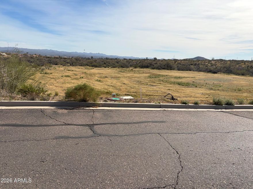PRESTIGIOUS THREE CROSSES  COMMUNITY BUILDING LOT

Looking for a great lot in an area of custom homes on paved streets? Look no further than Three Crosses Lot 60! Slightly under 2ac with mountain views. Very nice level lot for what should be a nice easy build. CC&R's protect the integrity of the neighborhood without any HOA fees. Paved streets with all utilities either on the property. Walk the lot today! Brand new home currently going up next to the lot demonstrates value of the property.  Owner has other nearby lots available as well.  Owner is a builder and can also offer a build job or you can buy lot outright.