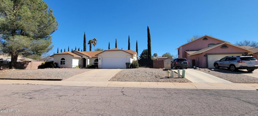 This adorable home is move in ready. There is a great room type floor plan and a nicely arranged kitchen with quite a bit of counter space. The master suite is beautiful with a new door out to the back covered patio. You will love the new vanity in the master bath too. there is an ample walk in closet and there is also what could be a 4th bedroom, or office with a closet. On the opposite side of the home are the rest of the bedrooms and very cute main bath. All of the appliances stay including the new dryer and older washer. The back yard is tiered to make it very usable with a built in bench and firepit for the cool evenings or smores! There is also room for a garden. There is an RV gate and secure RV parking as well. Do not miss this one!