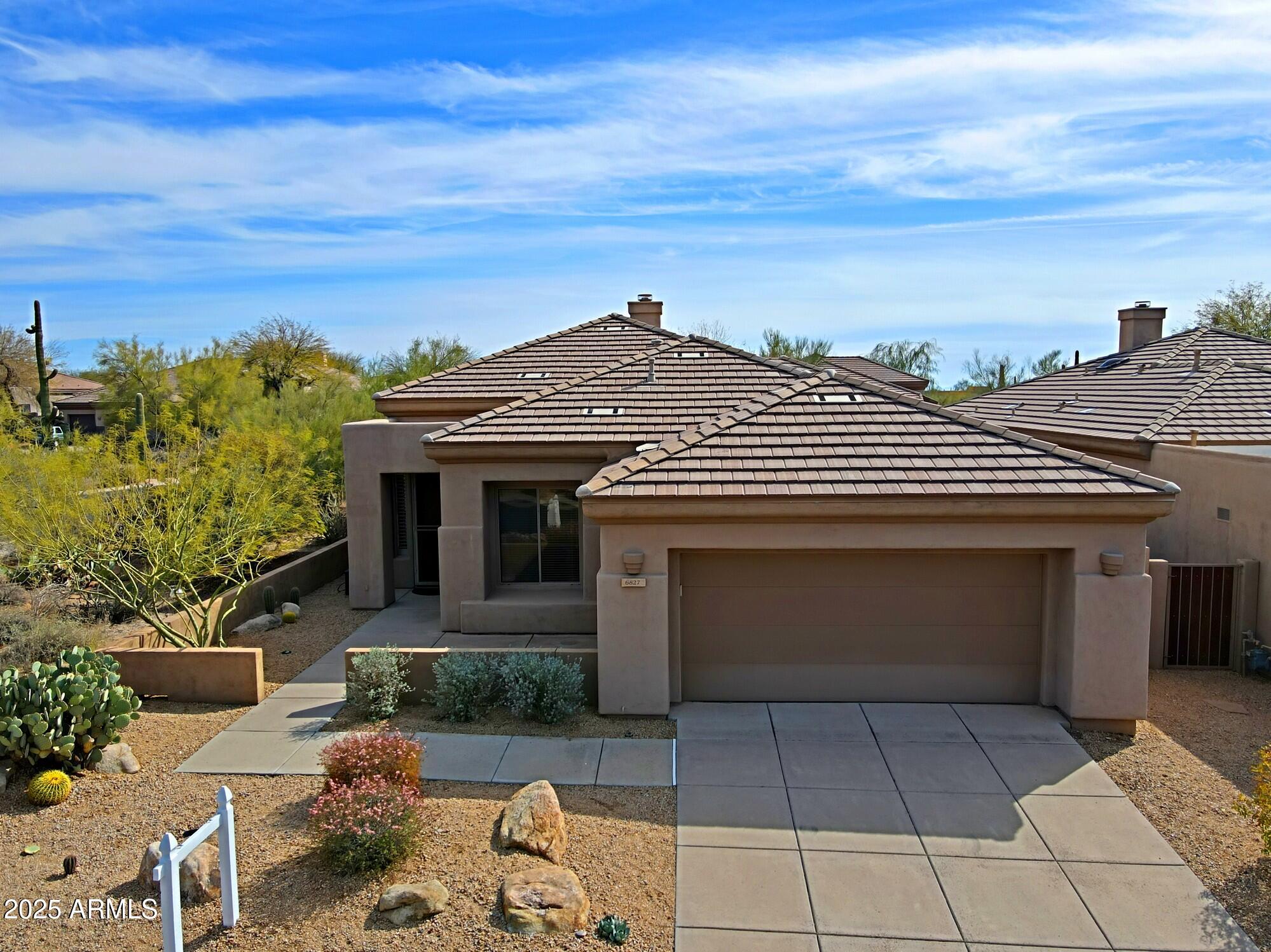 6827 E EAGLE FEATHER Road