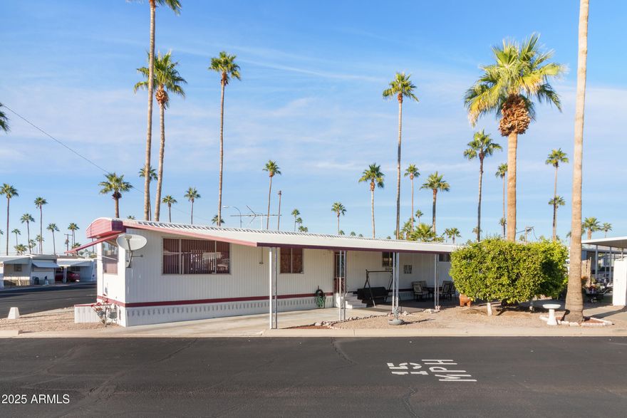 PRICE ENHANCEMENT***CORNER LOT***N/S FACING, FULLY FURNISHED, WELL CARED FOR HOME, OWNER HAS OWNED THIS HOME FOR 30+ YEARS, NEWER CENTRAL AC UNIT INSTALLED APPROX 1 YEAR AGO, ROOF ROUTINELY MAINTENANCED, WATER FILTRATION SYSTEM, EXTRA VISITOR PARKING WITHIN STEPS AWAY, TANDEM COVERED 2 CAR PARKING, LEMON AND ORANGE TREES, 2 SHEDS, EXIT IS CONVENIENTLY LOCATED TO ASSESSIBILTY ONTO SOSSAMAN, AGAVE VILLAGE IS A 55+ACTIVE ADULT,GATED COMMUNITY WITH 2 HEATED POOLS,HOT TUBS,COMMUNITY CENTER,FITNESS ROOM,BOCCE BALL,PICKLEBALL,COMMUNITY PARK,BARBECUE PAVILION,SHUFFLEBOARD,COMPUTER ROOM,ACTIVITIES AND MORE!LOT RENT $856.00 A MONTH,***RENTALS OK***