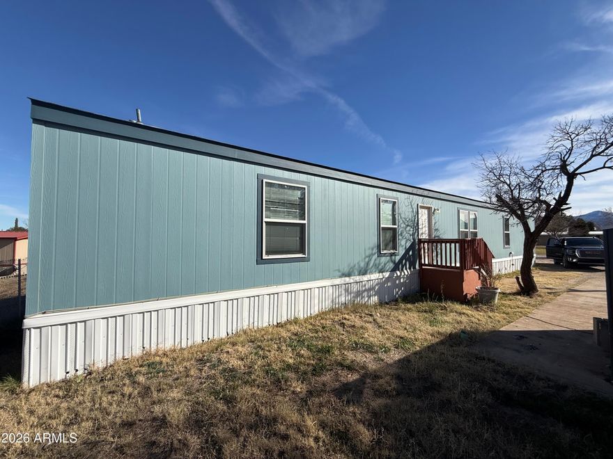 2017 built home in the Central Park Estates community with split floorpan, central heat and air. This property has been upgraded by its owner and looks amazing. Walking distance to shopping and restaurants, quiet community with views of the mountains. Space rental feee includes trash, water, sewer and road maintenance. Plenty of parking or space for relaxing. Concrete pad for a patio or shed.