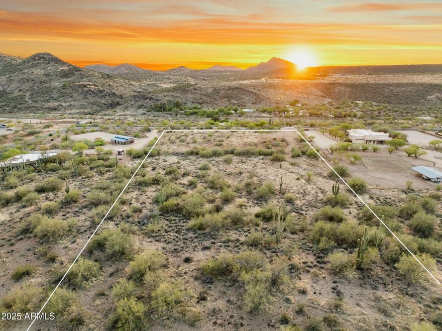 Create your family ranch or private retreat here on this 4.65 acres dream property in Cave Creek, near Spur Cross Ranch Conservation. Surrounded by stunning mountain vistas, unobstructed vibrant sunset skies and dark skies for starry nights. Included architectural plans for a 3,500sf house with 3 car garage, pool, a standalone 800sf guesthouse and a 1,383sf RV garage. Paved roads' access. Enjoy country living in one of the most desirable areas and near downtown Cave Creek, offers a perfect blend of desert serenity and modern amenities. With ample space for horse setup, pickleball court. This easy to build lot with plans ready for permits and newly installed private well, streamline the construction process. Act now to secure one of the few buildable lots of this calibre and acreage.