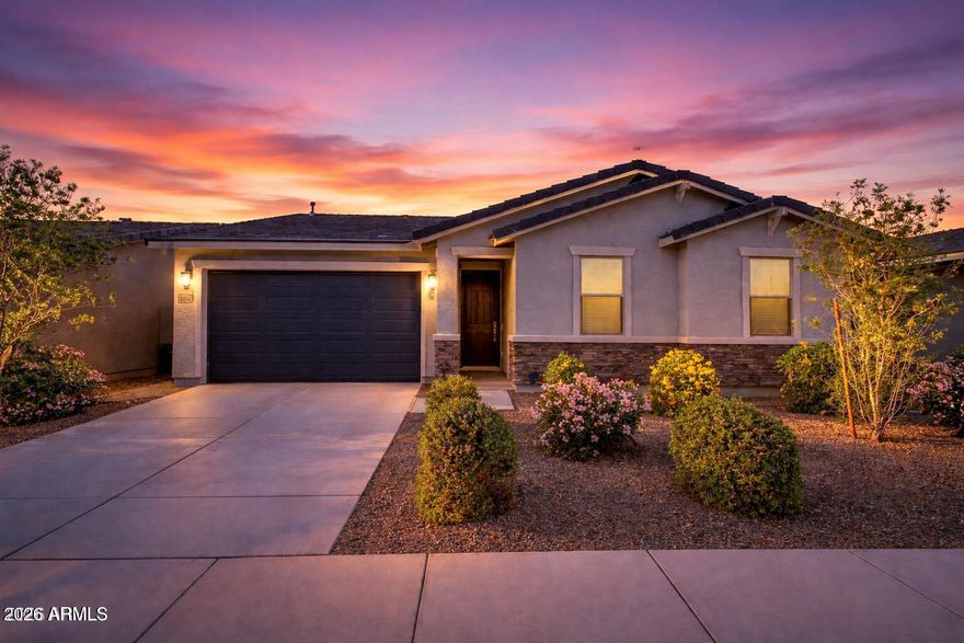 Better than a new build--this 4-bedroom, 2-bath home in Hurley Ranch already has the upgrades done for you, including a FULLY finished backyard with beautiful grass and laid pavers. The inviting interior showcases abundant natural light, a neutral palette, recessed and pendant lighting, tile flooring in the common areas, and Berber carpet in the bedrooms. The impeccable kitchen boasts upgraded stainless steel appliances, granite countertops, a large pantry, white shaker cabinets, and an island with a breakfast bar. Enjoy added convenience with a water softener and reverse osmosis system, helping protect against Arizona's hard water. Designed for everyday living and entertaining, the seamlessly flowing open layout is sure to impress. The spacious primary bedroom features an ensuite with dual sinks and a walk-in closet. Don't miss this excellent opportunity!