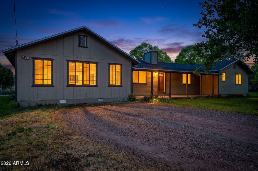 Located in the heart of Heber, this spacious 4 bedroom, 3 bath home offers comfort, charm, and room to enjoy both inside and out. Surrounded by mature trees and lush grass, the property features a comfortable floorplan with a formal living room highlighted by a striking stacked stone accent wall. The open kitchen, dining, and large great room create the perfect gathering space, complete with tons of kitchen cabinets, generous counter prep space, and a large walk-in pantry. Stay cozy by the wood burning stove while enjoying the warm, inviting atmosphere. Covered front and rear patios overlook the fenced backyard, offering plenty of space for entertaining, pets, or gardening. A barn adds extra storage and versatility to this wonderful Heber property.