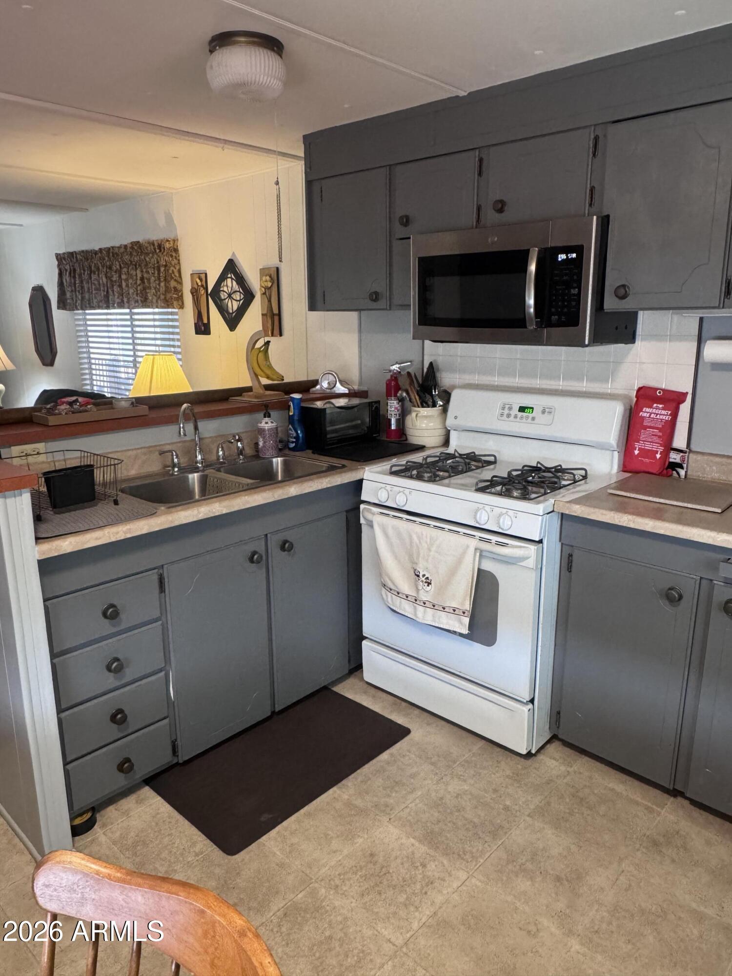 11425 E UNIVERSITY Drive 114