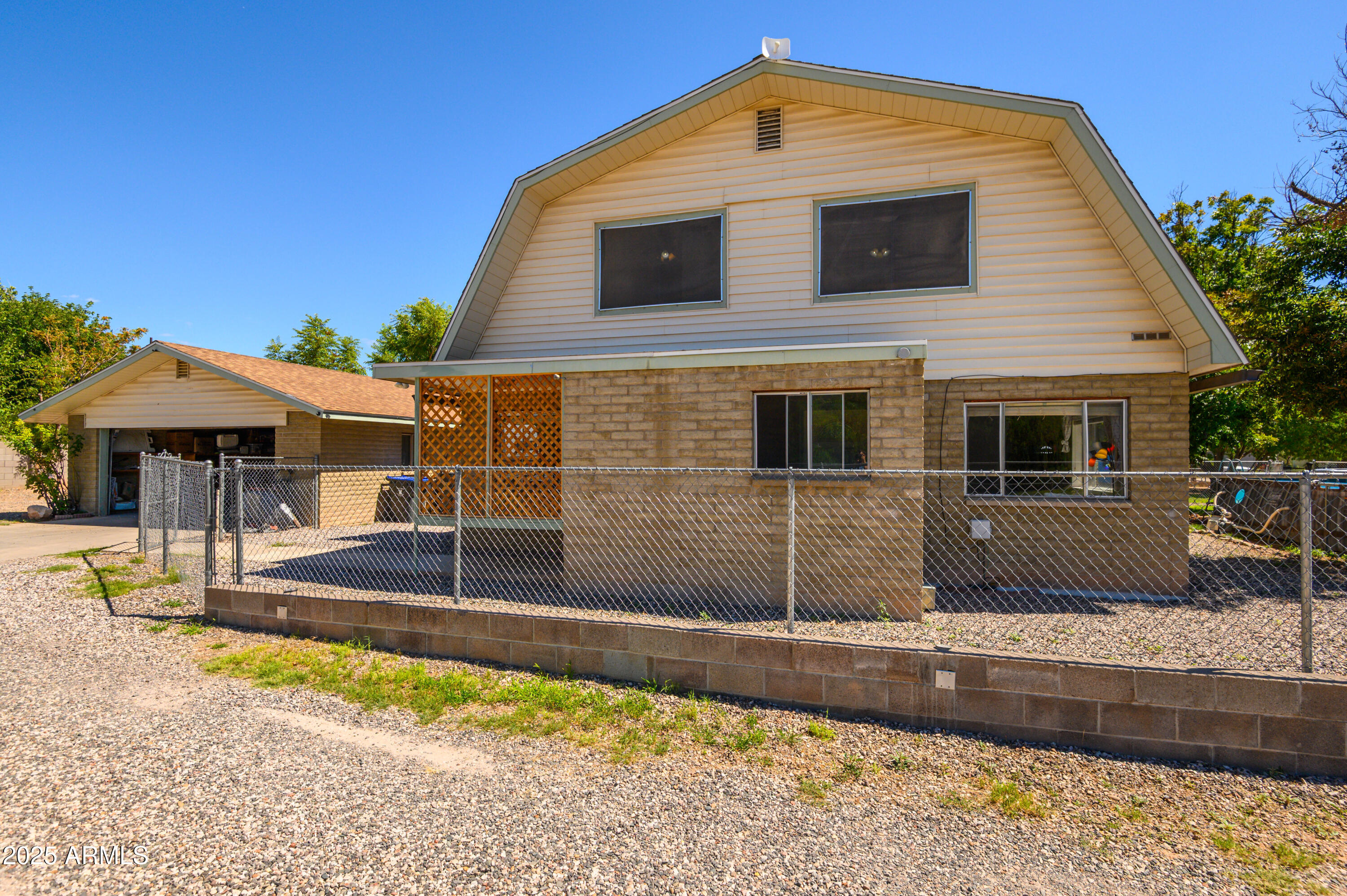 IRREG PCL BY M AND B LYING 177.87 FT E OF NW COR OF AND IN S2NE4NE4 SEC 12 15 3E CONT .67 AC - Residential