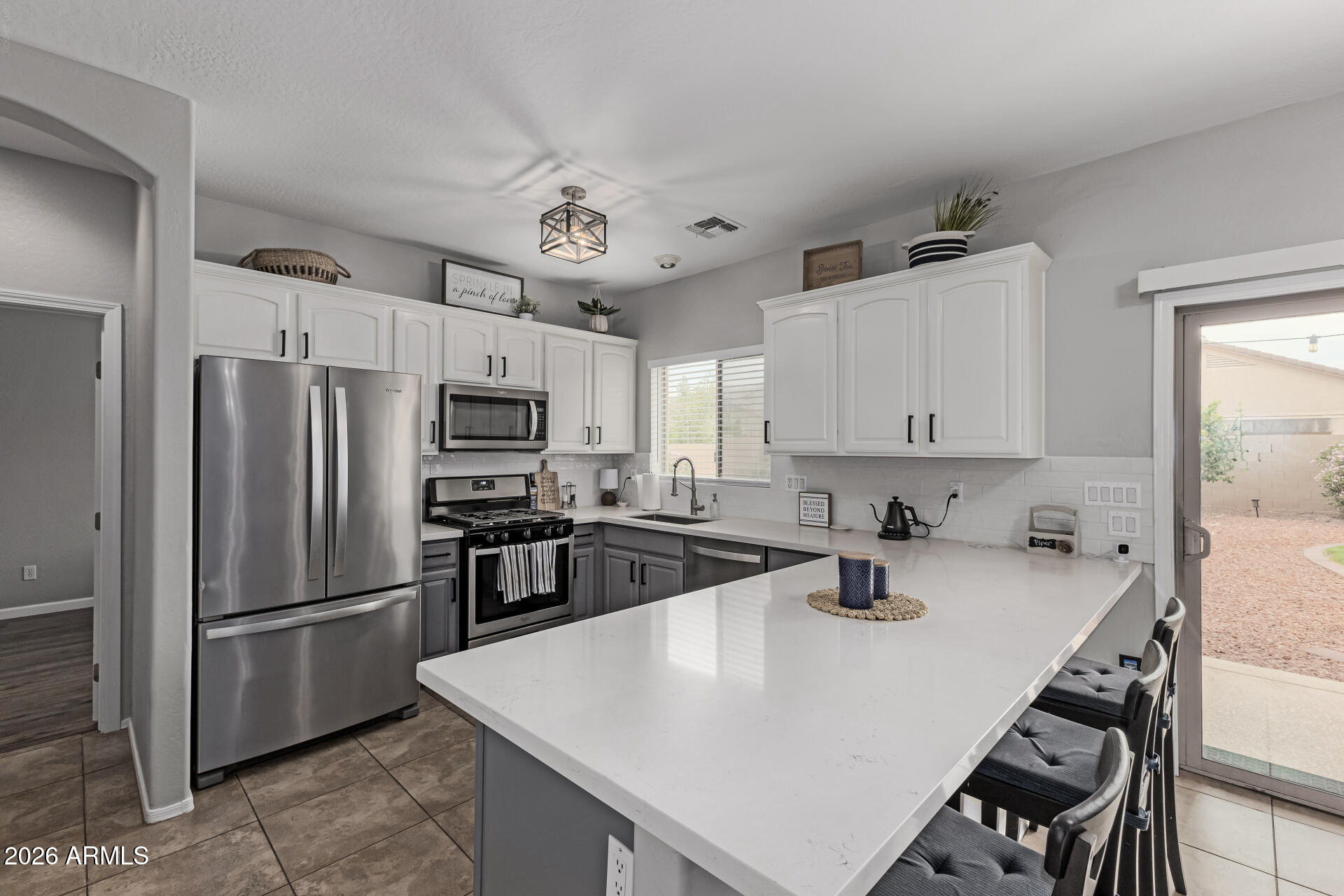 14135 W GELDING Drive